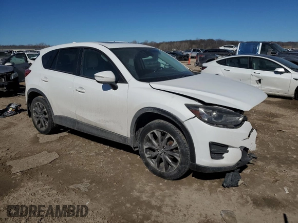 2016 Mazda CX-5 Grand Touring with VIN JM3KE4DYXG0781063, listed as a Copart auction lot 47099825 with 0 mi miles and Salvage Title. Bid and sale history available at carsss.com. Image 4.