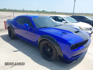 2021 Dodge Challenger R/T Scat Pack z VIN 2C3CDZFJ5MH538835, wystawiony jako IAAI lot #41358737 z przebiegiem 32 825 mil mil oraz . Historia ofert i sprzedaży dostępna na DreamBid. Obrazek 1.