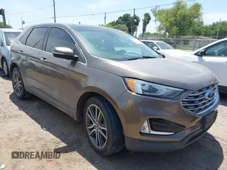 2019 Ford Edge Titanium z VIN 2FMPK3K91KBB48872, wystawiony jako IAAI lot #42020383 z przebiegiem 79 612 mil mil oraz . Historia ofert i sprzedaży dostępna na DreamBid. Obrazek 1.