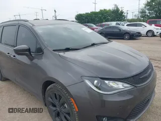 2020 Chrysler Pacifica Touring L with VIN 2C4RC1BG6LR247919, listed as a IAAI auction lot 41930508 with 66,952 mi miles and . Bid and sale history available at DreamBid. Image 6.