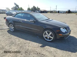 2005 Mercedes-Benz CLK 500 with VIN WDBTK75GX5T045859, listed as a Copart auction lot 51100995 with 130,761 mi miles and Salvage title. Bid and sale history available at DreamBid. Image 4.