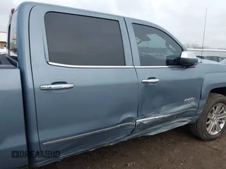2016 Chevrolet Silverado 1500 High Country with VIN 3GCUKTEC5GG131060, listed as a IAAI auction lot 41108622 with 138,372 mi miles and . Bid and sale history available at DreamBid. Image 6.