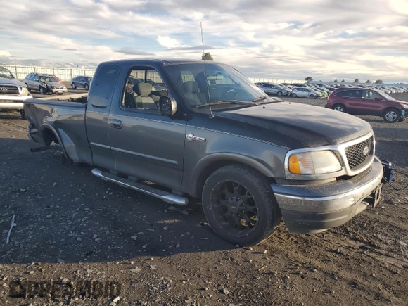 2003 Ford F-150 XL with VIN 1FTRX17L23NA98321, listed as a Copart auction lot 80576014 with 0 mi miles and Salvage Title. Bid and sale history available at carsss.com. Image 4.