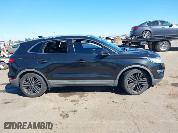 2015 Lincoln MKC with VIN 5LMTJ2AH6FUJ13505, listed as a IAAI auction lot 41871254 with 107,924 mi miles. Bid and sale history available at carsss.com. Image 13.