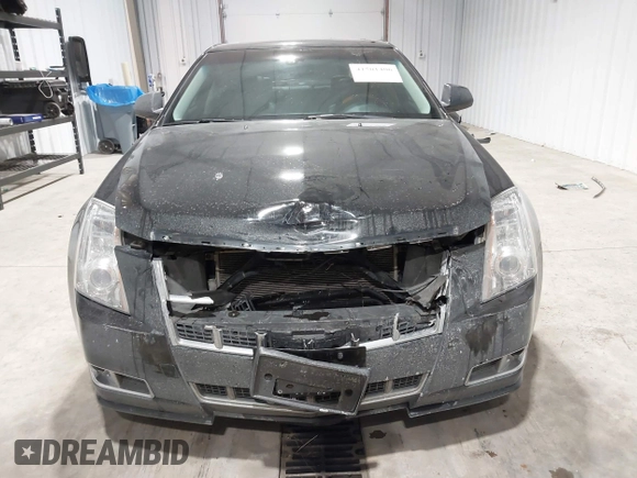 2013 Cadillac CTS Premium z VIN 1G6DS5E34D0103328, wystawiony jako IAAI lot #41501406 z przebiegiem 157 633 mil mil oraz . Historia ofert i sprzedaży dostępna na DreamBid. Obrazek 12.