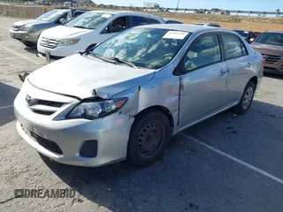 2011 Toyota Corolla L with VIN JTDBU4EE7BJ108265, listed as a IAAI auction lot 41969221 with 104,273 mi miles. Bid and sale history available at carsss.com. Image 2.