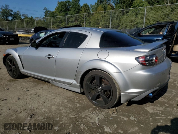 2004 Mazda RX-8 with VIN JM1FE17N040129638, listed as a Copart auction lot 72496364 with 57,966 mi miles and Salvage Title. Bid and sale history available at carsss.com. Image 2.