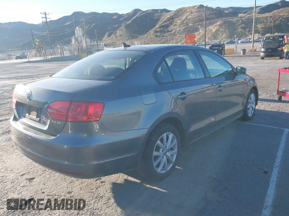 2012 Volkswagen Jetta Sedan SE w/Convenience with VIN 3VWDX7AJ7CM412976, listed as a IAAI auction lot 41823799 with 210,248 mi miles. Bid and sale history available at carsss.com. Image 4.