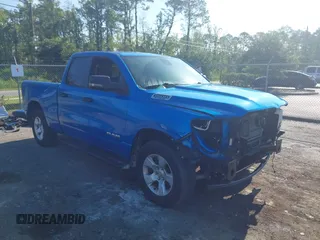 2023 Ram 1500 Big Horn with VIN 1C6RRFBG9PN596157, listed as a IAAI auction lot 42579791 with 14,303 mi miles and . Bid and sale history available at DreamBid. Image 1.