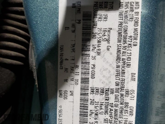 2012 Ford Focus SE with VIN 1FAHP3F27CL149328, listed as a Copart auction lot 56000325 with 147,097 mi miles and Salvage Title. Bid and sale history available at DreamBid. Image 12.
