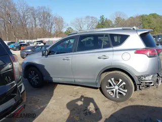 2016 Toyota RAV4 LE with VIN 2T3ZFREV0GW235051, listed as a IAAI auction lot 41750295 with 157,132 mi miles. Bid and sale history available at carsss.com. Image 14.