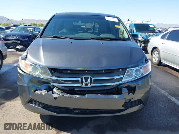 2012 Honda Odyssey EX-L with VIN 5FNRL5H64CB044075, listed as a IAAI auction lot 42094680 with 67,165 mi miles and . Bid and sale history available at carsss.com. Image 6.