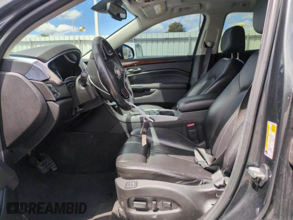 2014 Cadillac SRX Premium Collection z VIN 3GYFNGE34ES676646, wystawiony jako Copart lot #53478695 z przebiegiem 115 096 mil mil oraz Szkoda całkowita • Salvage title. Historia ofert i sprzedaży dostępna na DreamBid. Obrazek 7.