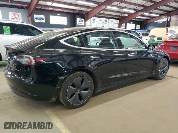 2018 Tesla Model 3 Long Range Battery z VIN 5YJ3E1EB4JF144295, wystawiony jako Copart lot #58754715 z przebiegiem 63 569 mil mil oraz Tytuł czysty. Historia ofert i sprzedaży dostępna na DreamBid. Obrazek 3.
