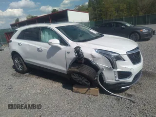 2023 Cadillac XT5 AWD Premium Luxury with VIN 1GYKNDRS5PZ141071, listed as a IAAI auction lot 36571530 with 2,822 mi miles and . Bid and sale history available at DreamBid. Image 1.