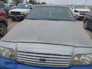 1999 Ford Crown Victoria Police with VIN 2FAFP71W5XX192230, listed as a IAAI auction lot 41629743 with 170,510 mi miles. Bid and sale history available at carsss.com. Image 10.