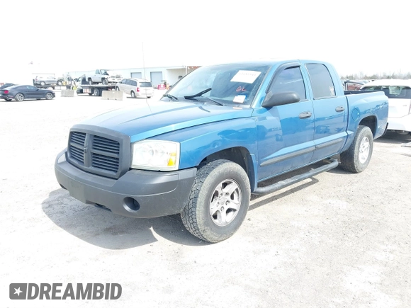 2006 Dodge Dakota SLT with VIN 1D7HE48K96S556831, listed as a IAAI auction lot 41681544 with 236,486 mi miles. Bid and sale history available at carsss.com. Image 2.