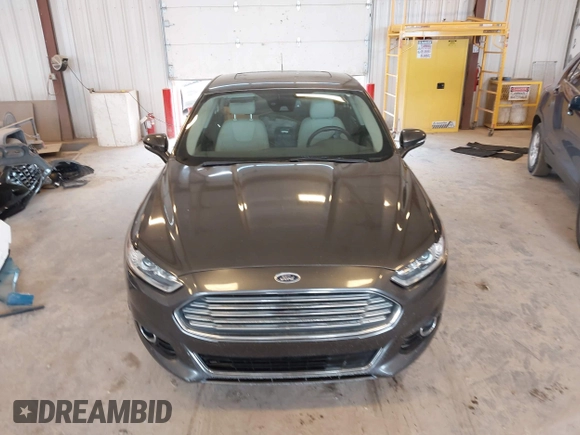 2016 Ford Fusion Titanium with VIN 3FA6P0D9XGR223354, listed as a IAAI auction lot 42621924 with Not provided miles and . Bid and sale history available at DreamBid. Image 12.