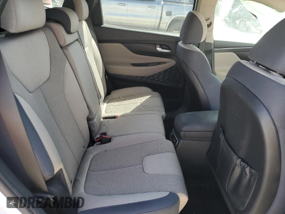 2022 Hyundai Santa Fe SEL z VIN 5NMS2DAJ3NH469026, wystawiony jako Copart lot #49979275 z przebiegiem Nie podano mil oraz Szkoda całkowita • Salvage title. Historia ofert i sprzedaży dostępna na DreamBid. Obrazek 11.