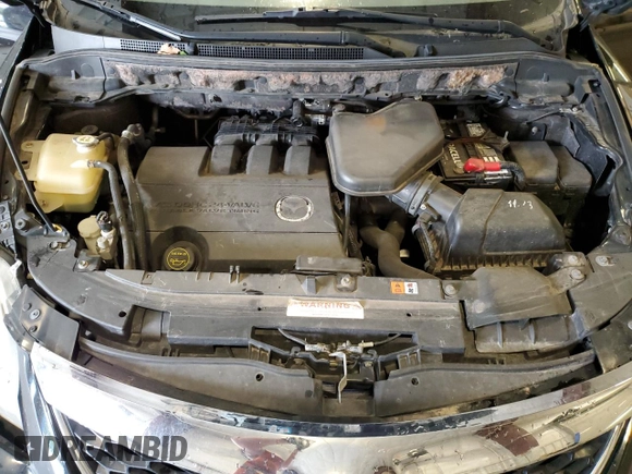 2011 Mazda CX-9 Grand Touring z VIN JM3TB3DV5B0303929, wystawiony jako Copart lot #59821825 z przebiegiem 149 663 mil mil oraz Szkoda całkowita • Salvage title. Historia ofert i sprzedaży dostępna na DreamBid. Obrazek 12.