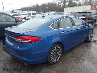 2018 Ford Fusion Hybrid Titanium with VIN 3FA6P0RU5JR141536, listed as a IAAI auction lot 41168269 with 54,754 mi miles. Bid and sale history available at carsss.com. Image 4.