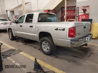 2005 Dodge Dakota Laramie with VIN 1D7HW58N75S188127, listed as a IAAI auction lot 41209206 with 117,480 mi miles and . Bid and sale history available at DreamBid. Image 3.
