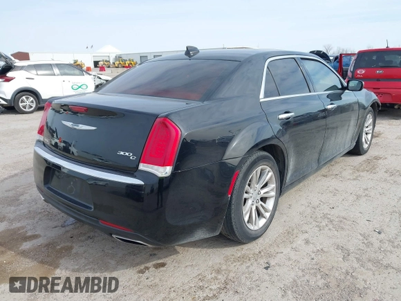 2016 Chrysler 300 with VIN 2C3CCAEG5GH189836, listed as a IAAI auction lot 41739098 with 141,179 mi miles. Bid and sale history available at carsss.com. Image 4.