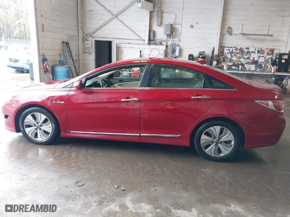 2015 Hyundai Sonata Hybrid Limited with VIN KMHEC4A44FA125717, listed as a IAAI auction lot 42017775 with 174,779 mi miles. Bid and sale history available at carsss.com. Image 15.