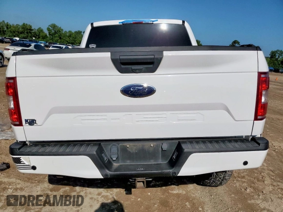 2018 Ford F-150 XL with VIN 1FTEW1E59JKF20623, listed as a Copart auction lot 58075035 with 66,949 mi miles and Salvage title. Bid and sale history available at DreamBid. Image 6.