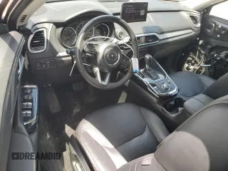 2020 Mazda CX-9 Touring с VIN JM3TCACY2L0414453, выставлен на аукционе Copart как лот 63451845 с пробегом 65 380 миль миль и Списание • Salvage title. История ставок и продаж доступна на DreamBid. Изображение 8.