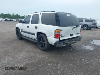 2003 Chevrolet Tahoe LS z VIN 1GNEC13Z53R173663, wystawiony jako IAAI lot #42695621 z przebiegiem 431 013 mil mil oraz . Historia ofert i sprzedaży dostępna na DreamBid. Obrazek 3.