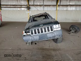 1996 Jeep Grand Cherokee Laredo with VIN 1J4GZ58S6TC304597, listed as a Copart auction lot 52962545 with Not provided miles and Salvage title. Bid and sale history available at DreamBid. Image 5.