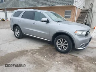 2014 Dodge Durango Limited z VIN 1C4RDJDG2EC976361, wystawiony jako IAAI lot #42151560 z przebiegiem 151 522 mil mil oraz . Historia ofert i sprzedaży dostępna na DreamBid. Obrazek 1.