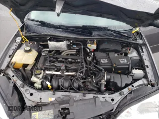 2007 Ford Focus S z VIN 1FAHP34N07W177912, wystawiony jako Copart lot #60481025 z przebiegiem 114 086 mil mil oraz Szkoda całkowita • Salvage title. Historia ofert i sprzedaży dostępna na DreamBid. Obrazek 11.