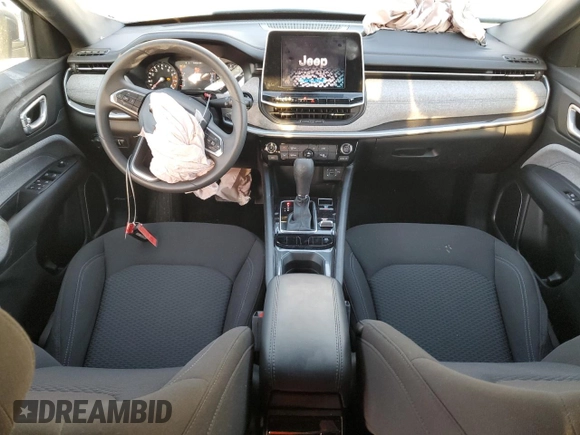 2025 Jeep Compass Sport with VIN 3C4NJDAN9ST516030, listed as a Copart auction lot 52292005 with 2,094 mi miles and Salvage title. Bid and sale history available at DreamBid. Image 8.