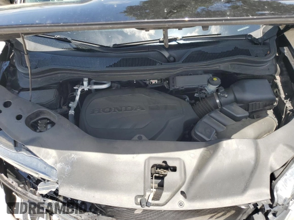 2021 Honda Passport EX-L with VIN 5FNYF7H58MB005187, listed as a Copart auction lot 60414535 with 75,208 mi miles and Salvage title. Bid and sale history available at DreamBid. Image 12.