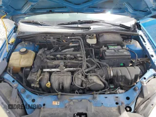 2007 Ford Focus S with VIN 1FAFP34N67W101523, listed as a Copart auction lot 56521835 with 239,505 mi miles and Salvage title. Bid and sale history available at DreamBid. Image 11.
