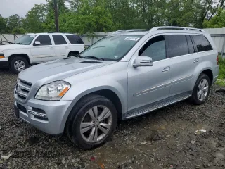 2012 Mercedes-Benz GL 450 z VIN 4JGBF7BE5CA799390, wystawiony jako Copart lot #56833415 z przebiegiem 129 994 mil mil oraz Szkoda całkowita • Salvage title. Historia ofert i sprzedaży dostępna na DreamBid. Obrazek 1.
