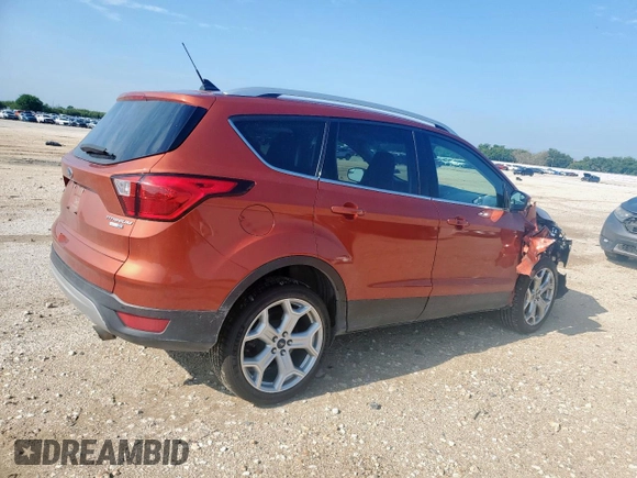 2019 Ford Escape Titanium с VIN 1FMCU9J95KUB54634, выставлен на аукционе Copart как лот 58171885 с пробегом 39 823 миль миль и Списание • Salvage title. История ставок и продаж доступна на DreamBid. Изображение 3.