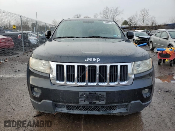 2011 Jeep Grand Cherokee Laredo with VIN 1J4RS4GG8BC508482, listed as a Copart auction lot 79261304 with 208,265 mi miles and Salvage Title. Bid and sale history available at DreamBid. Image 5.