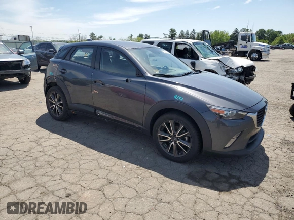 2017 Mazda CX-3 Touring z VIN JM1DKFC76H0149368, wystawiony jako Copart lot #55747305 z przebiegiem 47 946 mil mil oraz Szkoda całkowita • Salvage title. Historia ofert i sprzedaży dostępna na DreamBid. Obrazek 4.