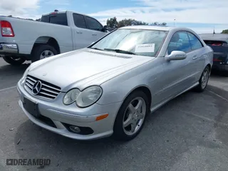 2004 Mercedes-Benz CLK-Class 5.0L with VIN WDBTJ75J34F071716, listed as a IAAI auction lot 41818093 with 100,142 mi miles. Bid and sale history available at carsss.com. Image 2.
