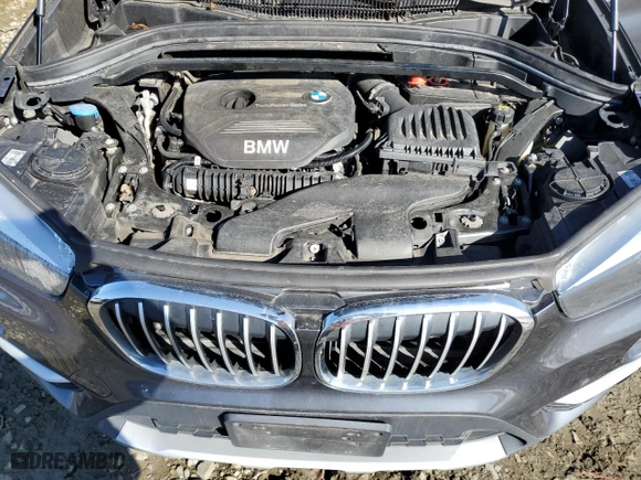 2018 BMW X1 xDrive28i with VIN WBXHT3C30J5K27472, listed as a Copart auction lot 52106655 with 120,936 mi miles and Clean Title. Bid and sale history available at carsss.com. Image 12.