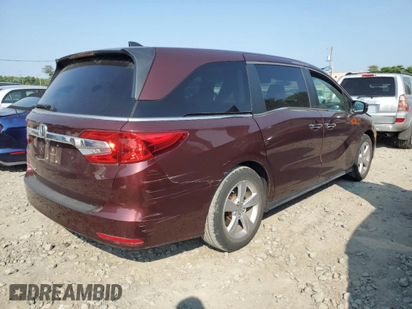 2019 Honda Odyssey EX-L z VIN 5FNRL6H77KB090836, wystawiony jako Copart lot #59514165 z przebiegiem Nie podano mil oraz Szkoda całkowita • Salvage title. Historia ofert i sprzedaży dostępna na DreamBid. Obrazek 3.