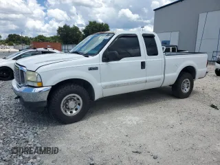 2003 Ford F-250 XL with VIN 1FTNX20L63EB37975, listed as a Copart auction lot 65723935 with 157,377 mi miles and Salvage title. Bid and sale history available at DreamBid. Image 1.