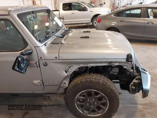 2021 Jeep Gladiator High Altitude with VIN 1C6HJTFG1ML556741, listed as a IAAI auction lot 42240680 with 47,926 mi miles and . Bid and sale history available at DreamBid. Image 6.