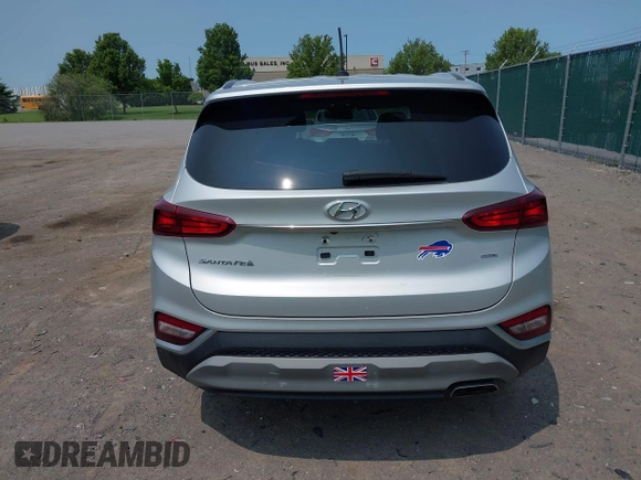 2019 Hyundai Santa Fe SE z VIN 5NMS2CAD2KH058961, wystawiony jako IAAI lot #42395683 z przebiegiem 81 228 mil mil oraz . Historia ofert i sprzedaży dostępna na DreamBid. Obrazek 16.