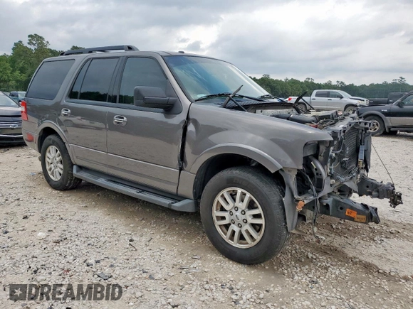 2014 Ford Expedition XLT with VIN 1FMJU1H54EEF41878, listed as a Copart auction lot 59671515 with 95,082 mi miles and Salvage title. Bid and sale history available at DreamBid. Image 4.