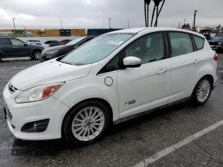 2015 Ford C-Max Energi SEL with VIN 1FADP5CU8FL101583, listed as a Copart auction lot 82705453 with 135,492 mi miles. Bid and sale history available at carsss.com. Image 1.