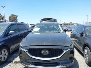 2018 Mazda CX-5 Grand Touring with VIN JM3KFADM4J0326760, listed as a IAAI auction lot 41885100 with 82,091 mi miles and . Bid and sale history available at DreamBid. Image 12.